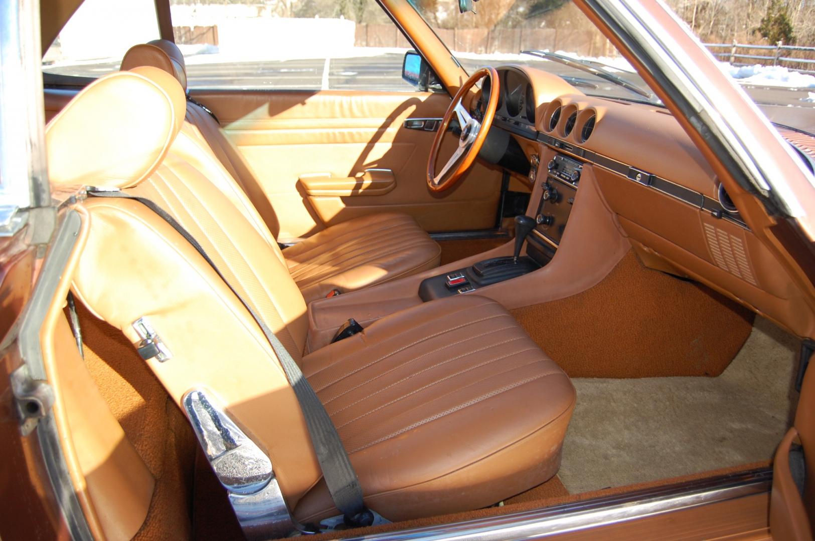 1976 Brown /Brown Leather Mercedes-Benz 450SL (10704412030) with an 4.5L V8 engine, Automatic transmission, located at 6528 Lower York Road, New Hope, PA, 18938, (215) 862-9555, 40.358707, -74.977882 - Here we have a nice 1976 Mercedes 450SL convertible with a 4.5L V8 engine putting power to the rear wheels via an automatic transmission. Some options on this vehicle include brown leather, wood trim, power windows, removable hard top, heat, A/C, AM/FM radio, cruise control, wood steering wheel, 14 - Photo#12